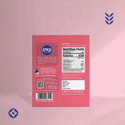 The back of a pink SKS , displaying the ingredients, nutrition facts, and barcode, set against a solid pink background with subtle blue geometric accents.