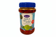 Jar of Muralis Amla Pickle with blue lid on a white background