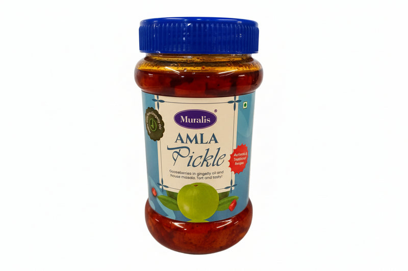 Jar of Muralis Amla Pickle with blue lid on a white background