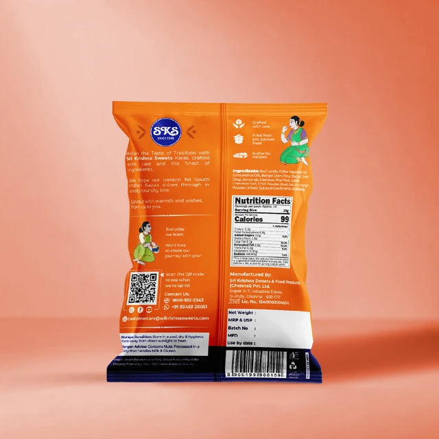 The back of an orange 8X5 brand potato chip bag standing upright on a dark blue display block against a peach-pink gradient background.