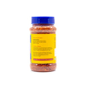 A bottle of Muralis Kobbari Karam ingredients and product information with a blue cap and a yellow label, shown against a plain white background.