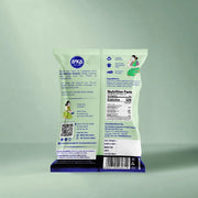 Back of a 6X6 branded snack bag standing upright on a matching blue and purple branded base, photographed against a pale mint green studio background.