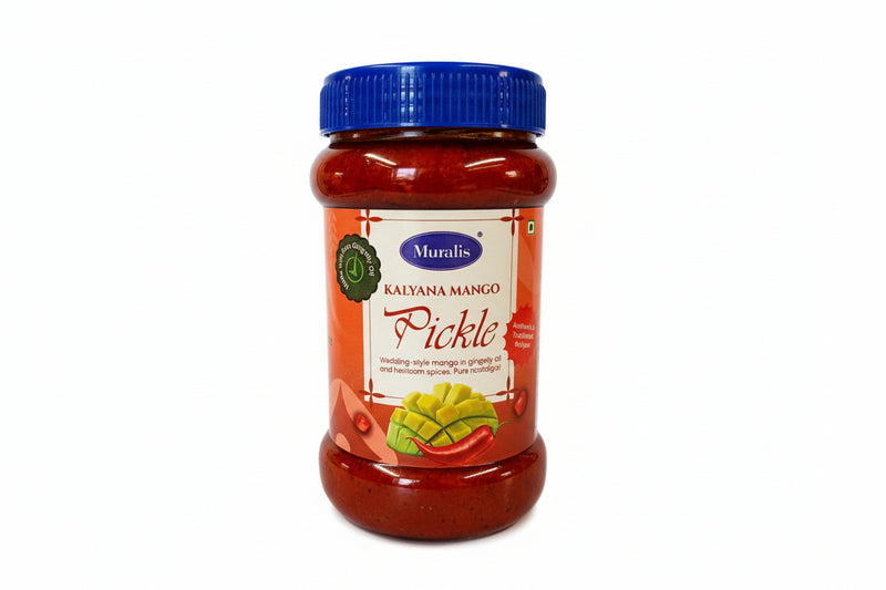Jar of Murali Kalyana Mango Pickle with a blue lid on a white background