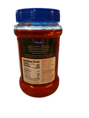 Jar of Muralis mango pickle with a blue lid on a white background