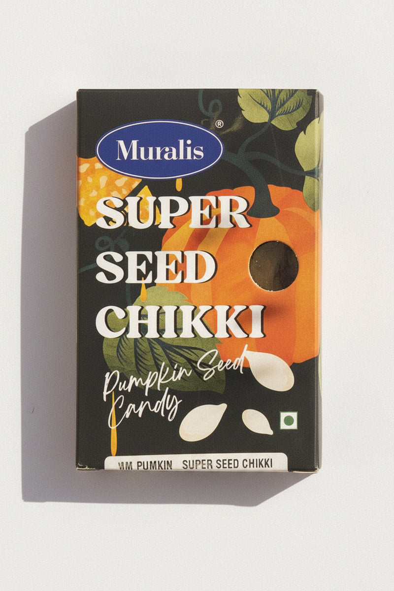Pumpkin Super Seed Chikki box with pumpkin artwork and visible pumpkin seed candy