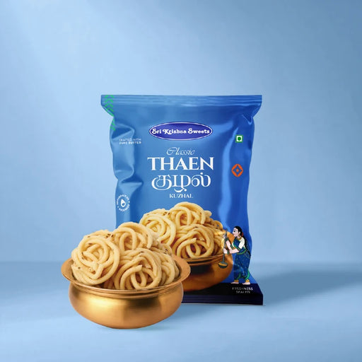 Classic Thaen Kuzhal packet with spiral shaped savoury snack served in a brass bowl