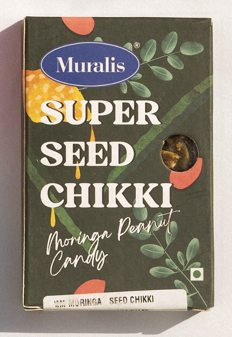 Moringa Seed Chikki box with botanical artwork and visible seed candy