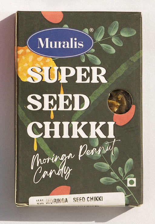 Moringa Seed Chikki box with botanical artwork and visible seed candy